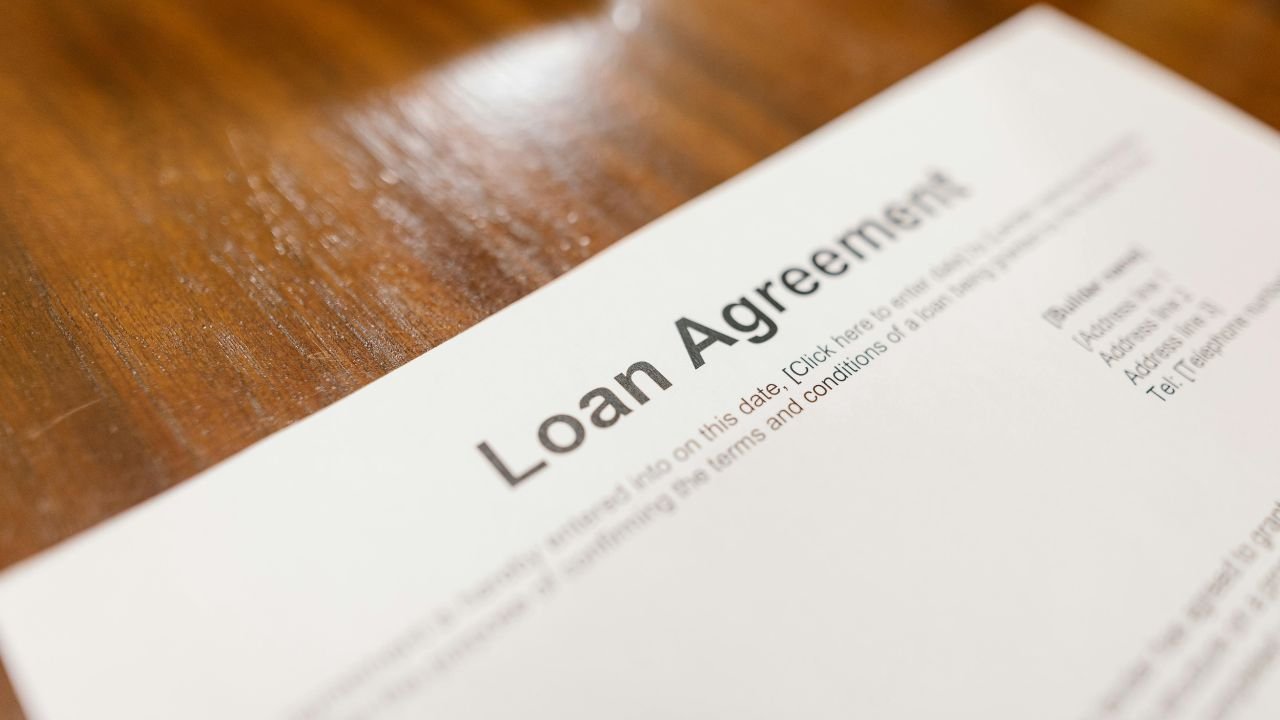 A loan agreement form on a table