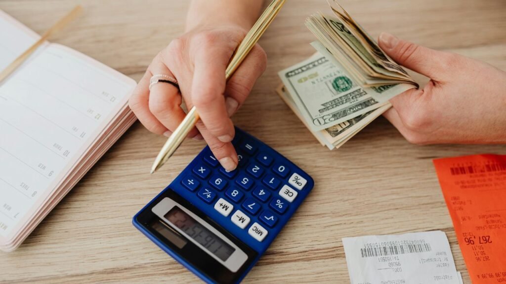 thinking clearly before making a financial decision using calculator and money